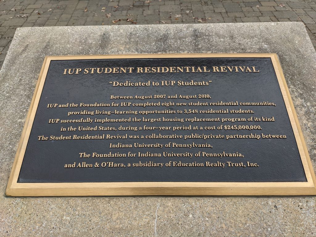 Plaque Dedicating IUP student residential revival - commemorating the eight residence halls built on campus between 2007 and 2010, the largest replacement student housing project of its type in the United States at a cost of $245M. outside of Pittsburgh Pennsylvania